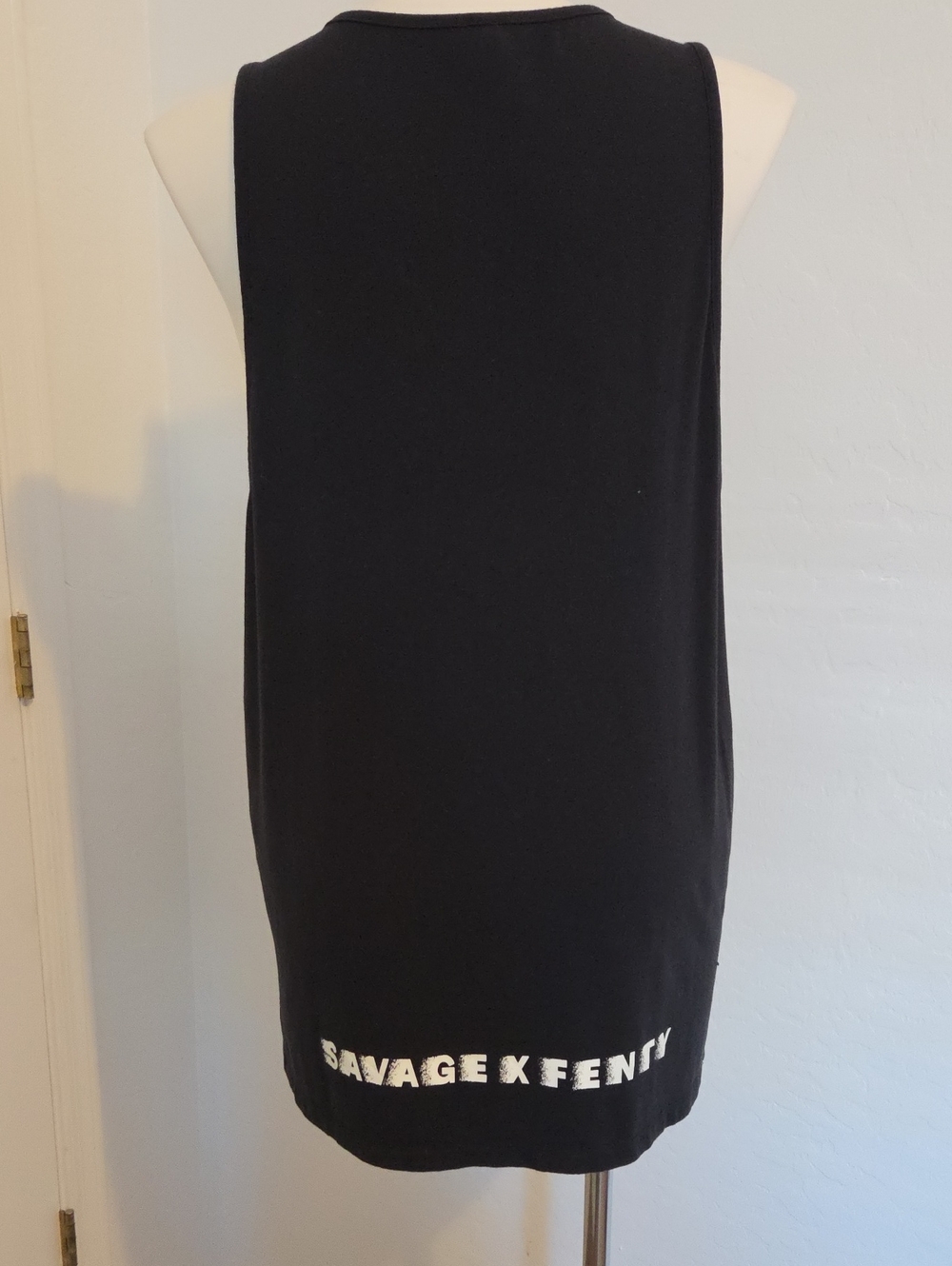 Mens Tank Top With "Savage X Fenty" On Lower Back Of Shirt.